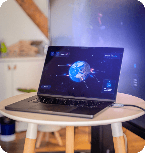 Ecran d'ordinateur représentant la terre et un réseau satellite